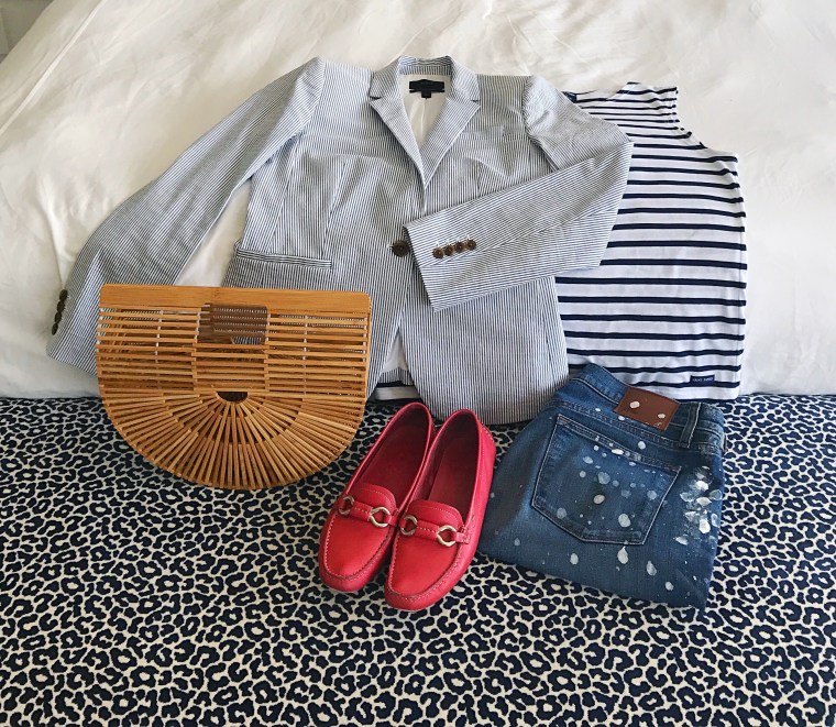 cult gaia st. james jcrew prada flatlay